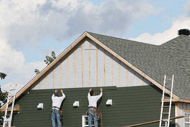 Professional Siding Contractor technician working in Oak Hill, OH